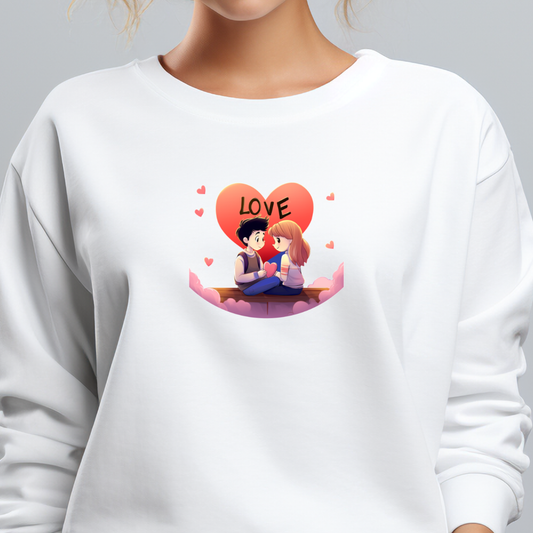 Moteriškas džemperis "Love Is..." - baltas moteriškas džemperis su stilizuotu romantiniu paveiksliuku, vaizduojančiu dvi figūras, sėdinčias prieš raudoną širdį, dekoruotas mažomis rožinėmis širdelėmis, sukuriantis jaukią ir šiltą atmosferą. Visi produktai, Moteriški džemperiai, Valentino dienos kolekcija, Perkamiausi džemperiai, Naujausi dizainai